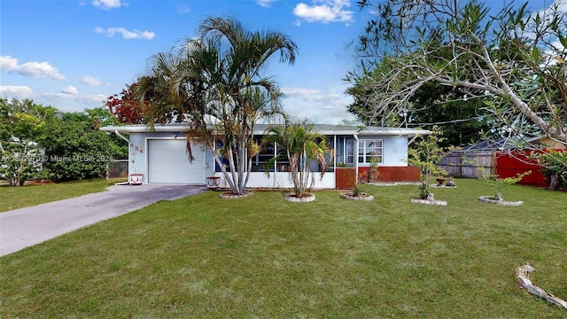 single story home with a garage and a front lawn