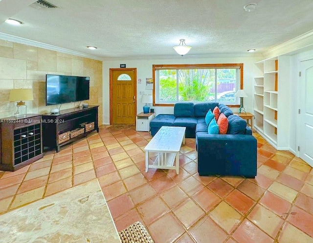 tiled living room featuring built in features, ornamental molding, and a textured ceiling