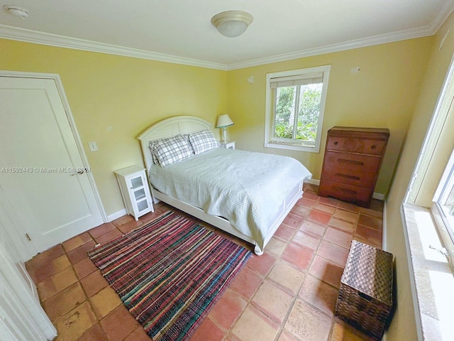 tiled bedroom featuring ornamental molding