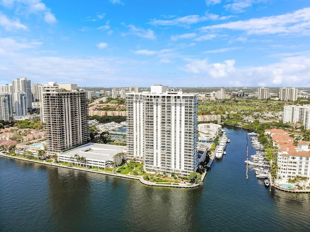 birds eye view of property featuring a water view