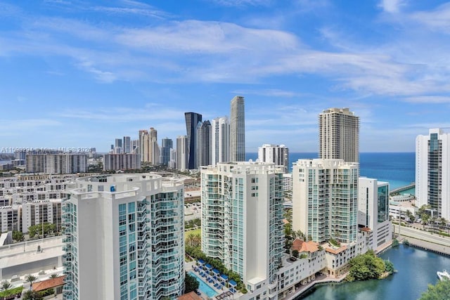 property's view of city with a water view