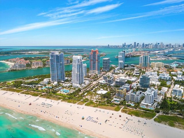 aerial view with a beach view and a water view