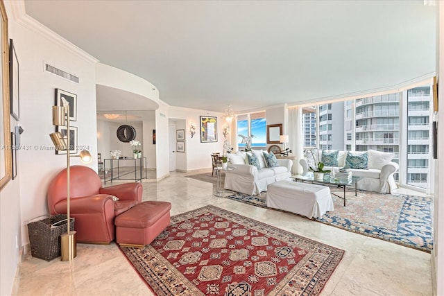 living room with tile flooring and ornamental molding