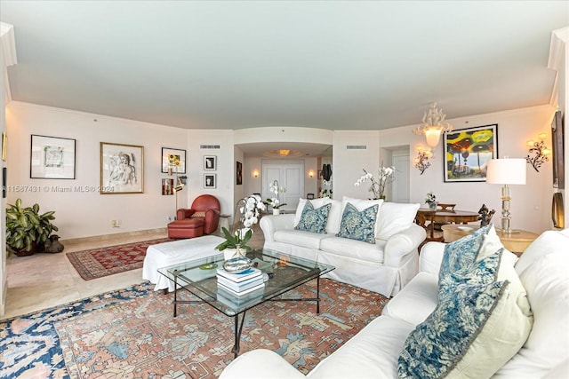 living room featuring tile floors and ornamental molding