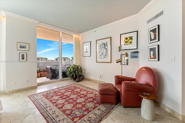 sitting room featuring tile floors and ornamental molding