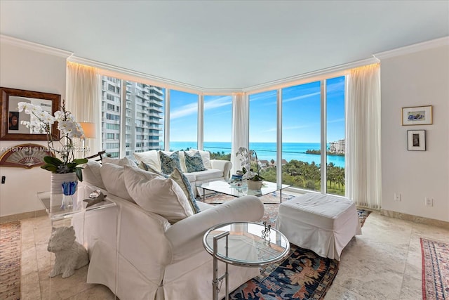 tiled living room with floor to ceiling windows, ornamental molding, and a water view