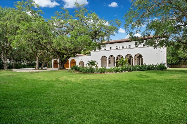 exterior space with a front lawn