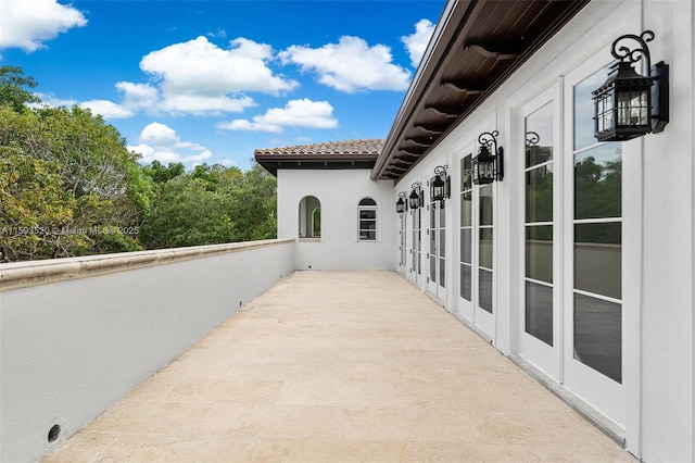 view of patio with a balcony