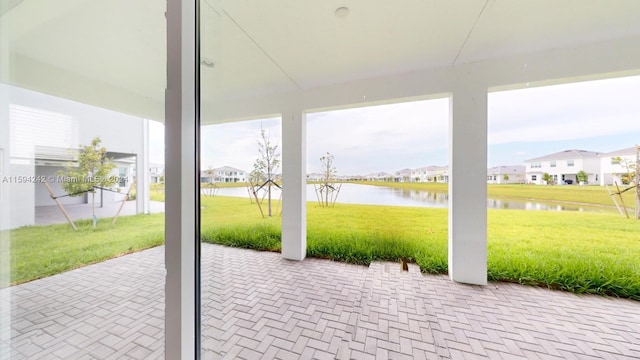 view of patio featuring a water view