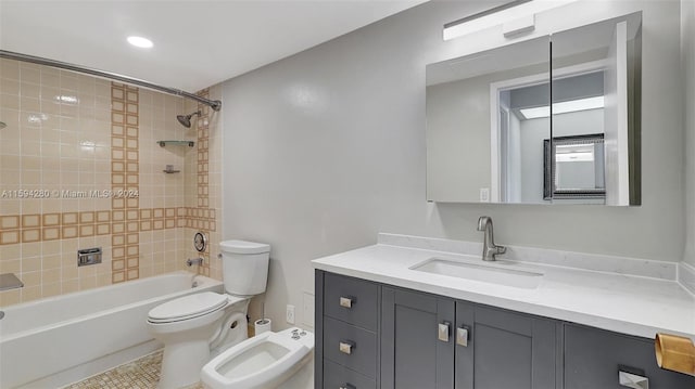 full bathroom with tile flooring, a bidet, tiled shower / bath combo, vanity, and toilet