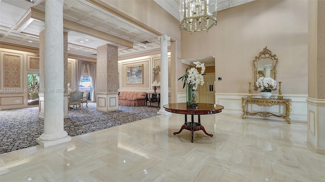 tiled foyer with crown molding, decorative columns, beam ceiling, a high ceiling, and coffered ceiling