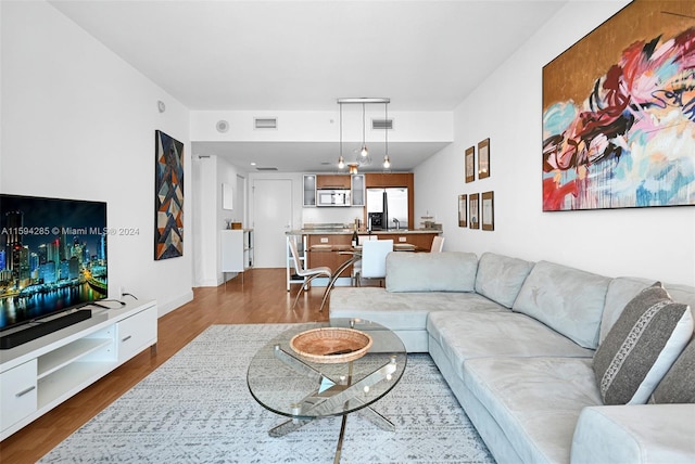 living room with hardwood / wood-style flooring