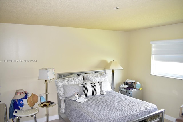 bedroom with a textured ceiling