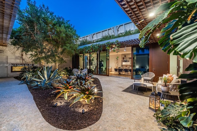 view of patio terrace at night