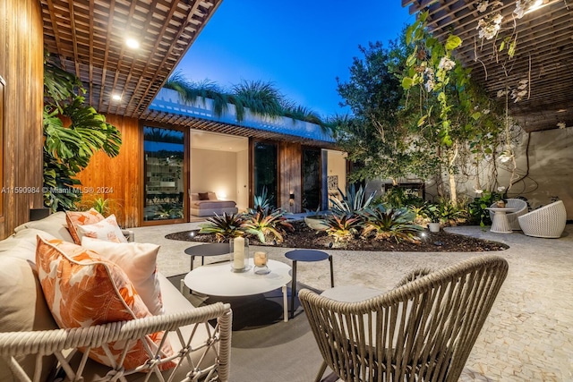 view of patio terrace at twilight