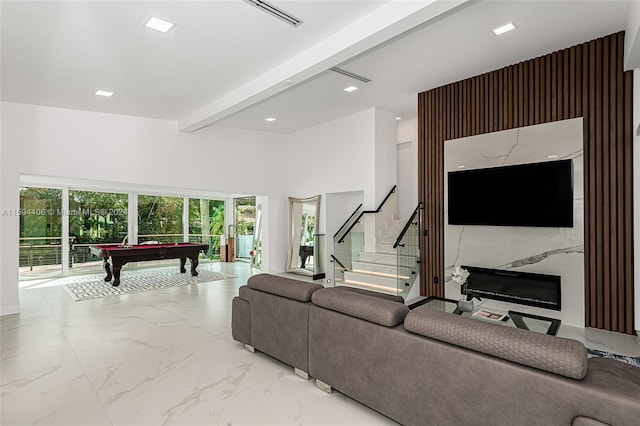 tiled living room with beamed ceiling and billiards