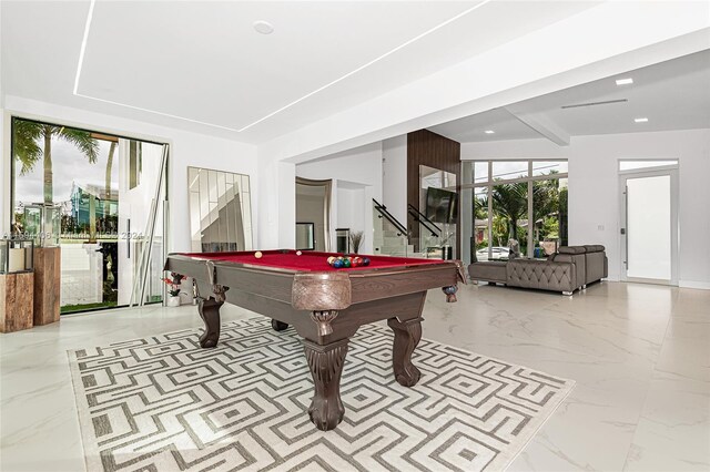 rec room with beamed ceiling, tile flooring, and pool table