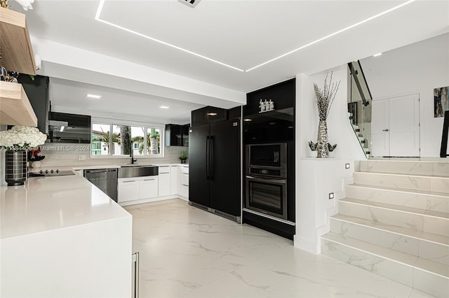 kitchen with black appliances, sink, backsplash, and light tile flooring