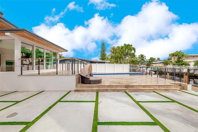 view of yard featuring a patio and a swimming pool