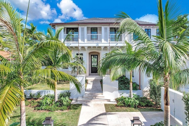 view of front of home featuring a balcony