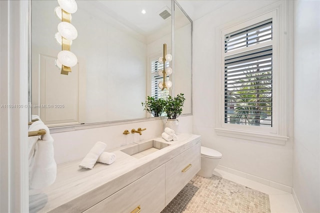 bathroom featuring toilet, a healthy amount of sunlight, tile patterned flooring, and visible vents