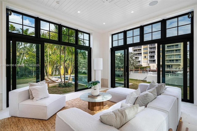 sunroom / solarium with a wealth of natural light and wooden ceiling