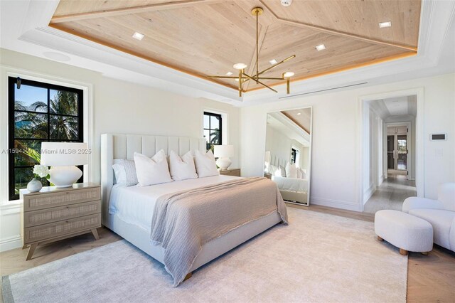 kitchen with premium range hood, a spacious island, sink, hanging light fixtures, and double oven range