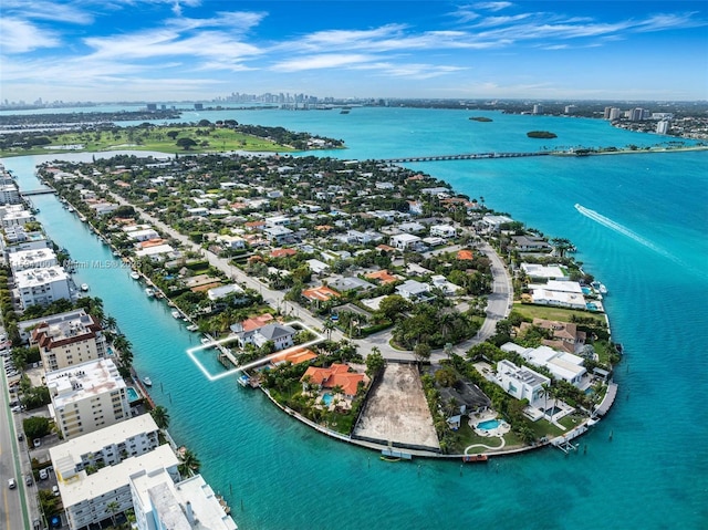 aerial view with a view of city and a water view