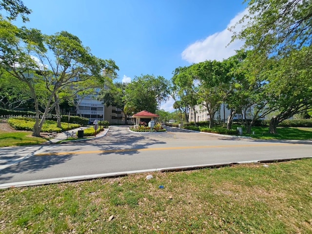 view of road with curbs