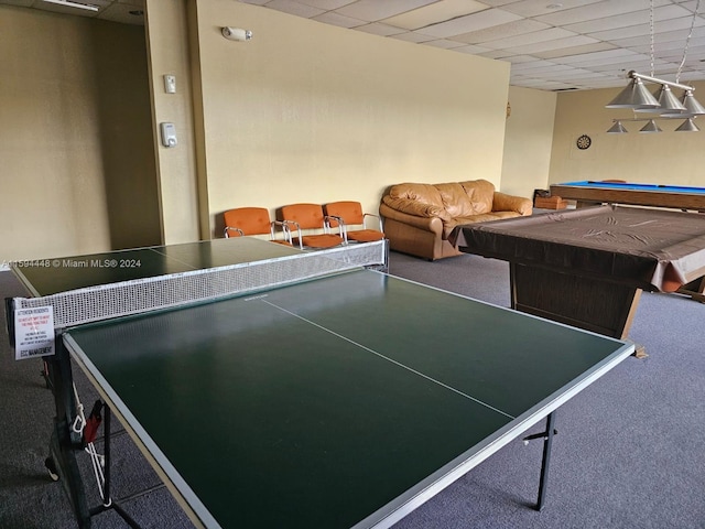 game room featuring pool table, a drop ceiling, and carpet floors