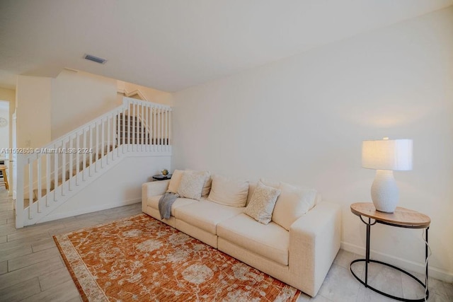 living room with light hardwood / wood-style flooring