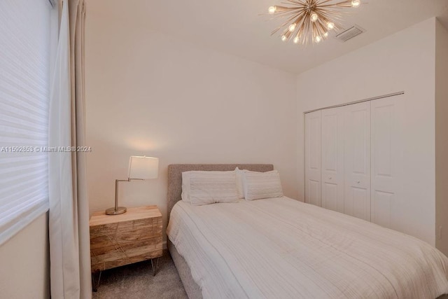 carpeted bedroom with a closet