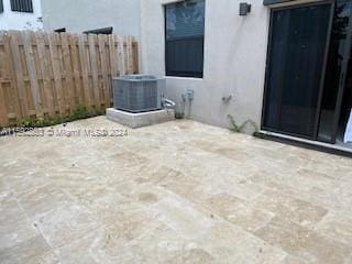 view of patio / terrace with central AC unit