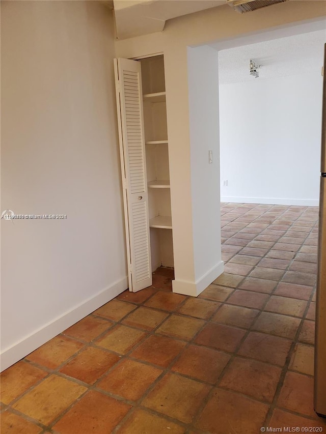 interior space with a closet