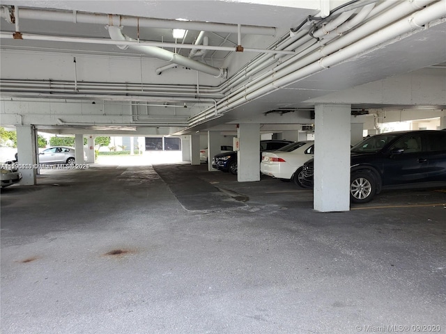 garage featuring a carport