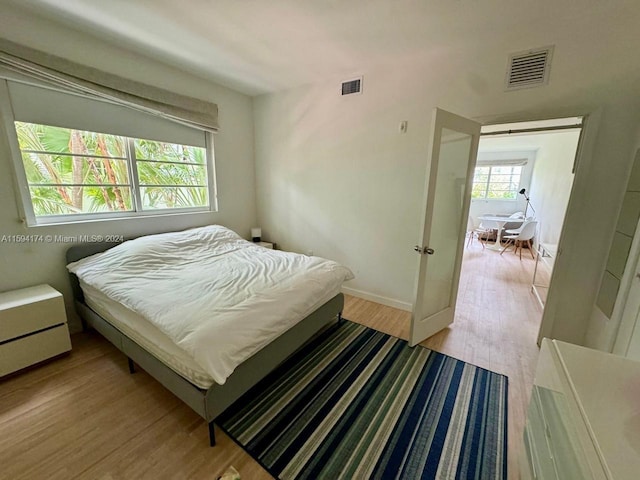 bedroom featuring light wood-type flooring