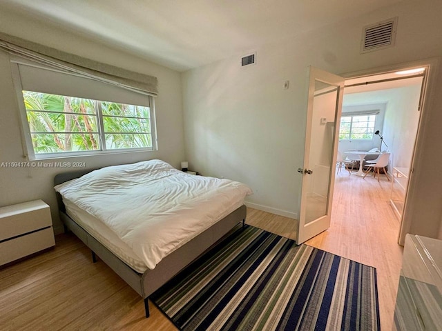 bedroom featuring light hardwood / wood-style floors