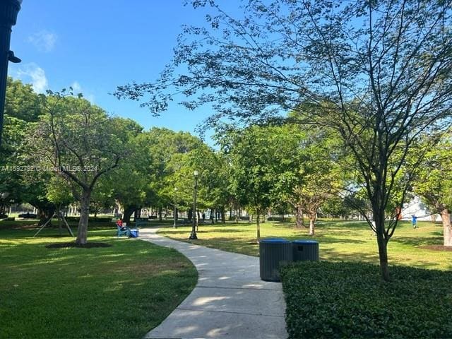 view of home's community featuring a yard