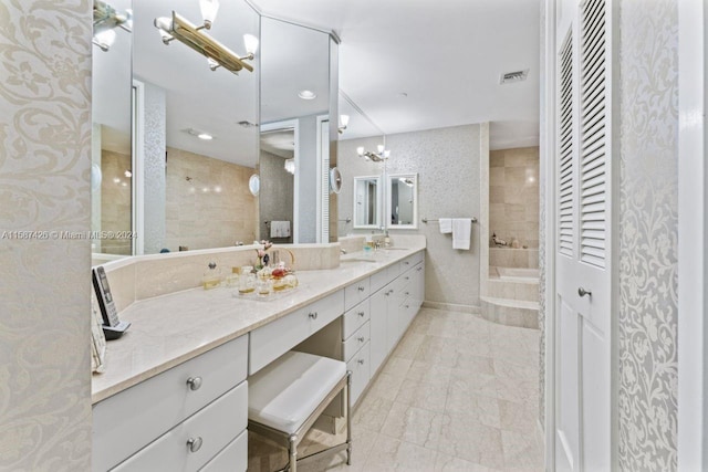 bathroom with tile flooring and large vanity