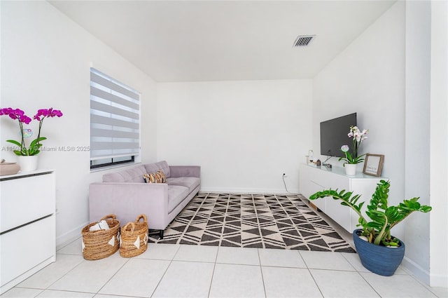 living room featuring light tile patterned floors