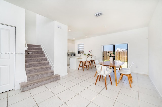 dining room featuring light tile patterned floors