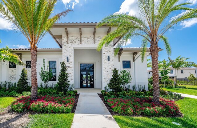 property entrance with french doors