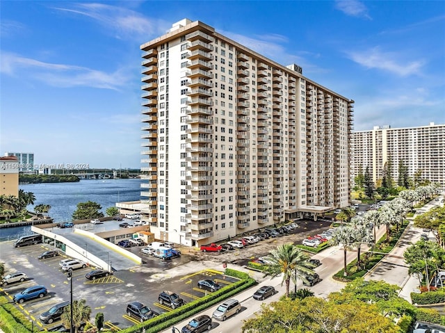 view of building exterior with a water view