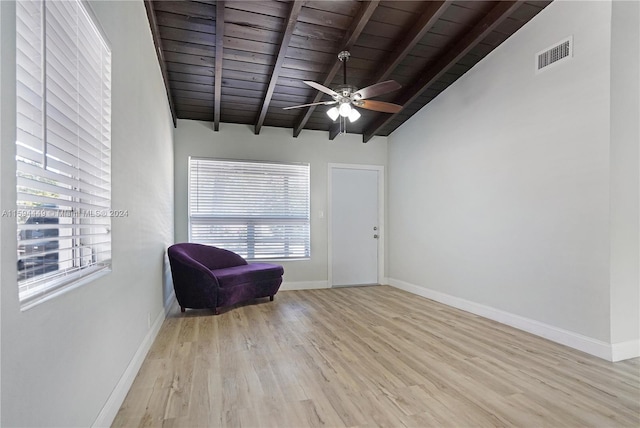 unfurnished room with wood ceiling, ceiling fan, light hardwood / wood-style floors, and vaulted ceiling with beams