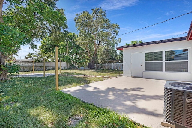 view of yard with a patio and cooling unit