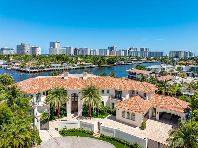 birds eye view of property featuring a water view