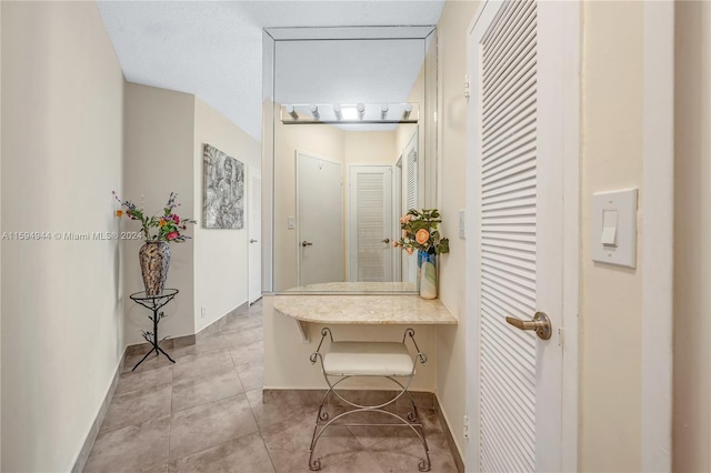 bathroom featuring tile patterned flooring