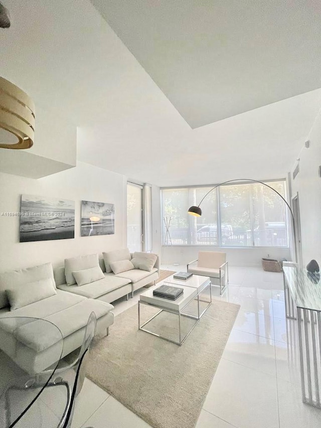 living room featuring light tile patterned floors