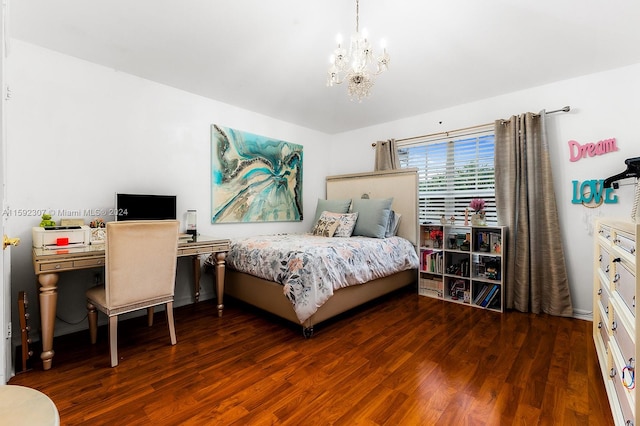 bedroom featuring a chandelier and dark wood-type flooring