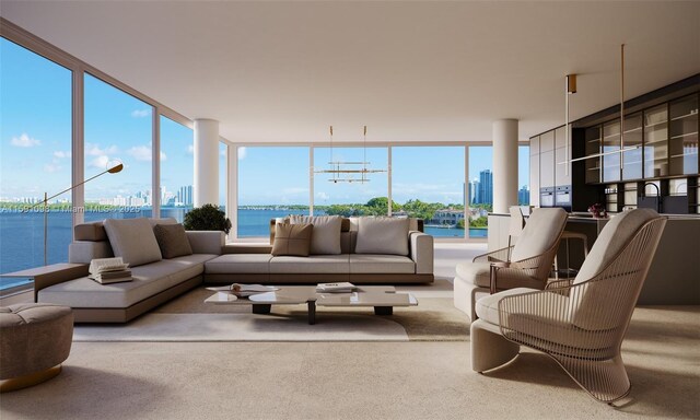 sunroom featuring a water view